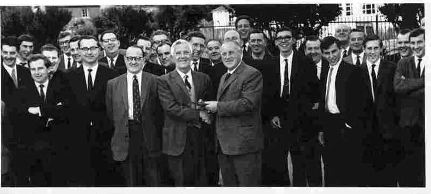 W.G.Elliott presenting to retiring caretaker Jack Reynolds.  